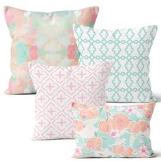 four pillows with different patterns on them, one in pink and the other in blue