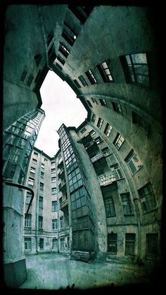 an image of some buildings taken from the ground