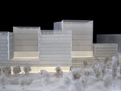 an architectural model of a building in the snow