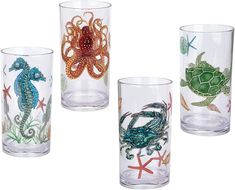 four glass cups with sea animals on them