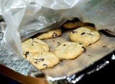 chocolate chip cookies sitting in a bag on top of a counter