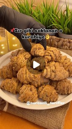 a white plate topped with cookies on top of a table