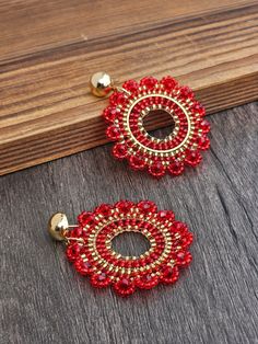 Definition of "statement earrings"! ✨️ Extra large, round, beaded earrings.  Absolutely stunning red color, suitable for any season ♥️ Please keep in mind that these beads are a little bit see trough, they look different on different backgrounds.  Will definitely help you stand out and be different from the crowd💯 Size- 4.3cm diameter.    Please note, the color might appear brighter in pictures. My apologies! We have a huge variety of studs and hooks available,if you would like to pick somethin Red Round Beaded Party Earrings, Elegant Red Hoop Earrings, Elegant Red Beaded Hoop Earrings, Red Round Beaded Earrings For Festive Occasions, Red Beaded Round Hoop Earrings, Red Hoop Earrings With Colorful Beads, Red Colorful Beads Hoop Earrings, Round Beaded Earrings, Red Beaded Earrings