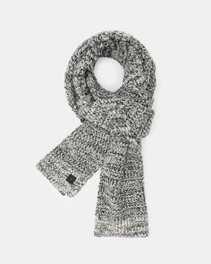 Knitted with a two-tone marl yarn, the Clay Scarf has a textured look to it. The shape is classic – it's a cozy staple that keeps you warm.  Scarf Soft handfeel Two-tone marl Leather Ramskull patch Warm Scarf, All Saints, Chalk, Two Tone, Scarf Accessory, Mens Accessories, Yarn, Leather