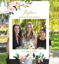 two women standing next to each other in front of a sign that says bridal shower