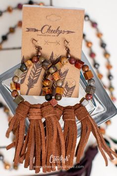 These hook-back earrings will hang around 5 " in length with the tassels. They are a must have! Always hypoallergenic, lead & nickel-free! Leather Tassel Earrings, Boho Jewelry Diy, Leather Jewelry Making, Brecciated Jasper, Homemade Earrings, Boho Earring, Diy Jewelry Earrings, Happy Clothes, Western Store