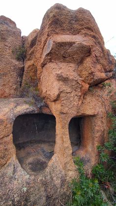 some very big rocks with small holes in them