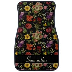 a car mat with flowers on it and the name samahha written in black