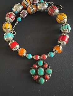 Nepalese vintage Turquoise Coral Pendant & Capped Tibetan Bohemian Bead Necklace | eBay Tibetan Necklace, Coral Pendant, Coral Jewelry, Coral Turquoise, Vintage Turquoise, Handmade Beads, Unique Necklaces, Silver Beads, Artisan Jewelry