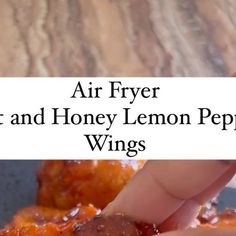 an air fryer that is being used to make hot and honey lemon pepper wings