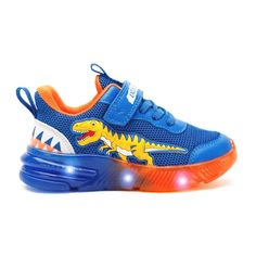 a child's blue and orange sneaker with an image of a dinosaur on it