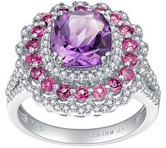 Raise a glass to this magnificent multi-gemstone cocktail ring, elegantly accented with white zircons.