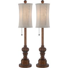 two wooden lamps with white shades on them