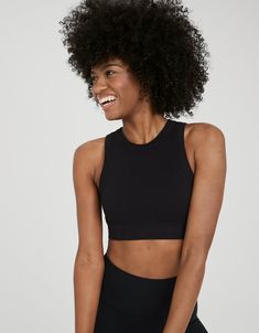 THE FABRIC: Our stretchy-yet-supportive seamless: now with a cotton feel! Keeps its shape & moves with you./THE DEETS: A high neck for extra support and coverage./MORE DEETS: Love x 2! Wear as a top with your fave bike shorts, or as a bra under all y Aerie Bras, High Neck Sports Bra, High Neck Crop Top, Offline By Aerie, Medium Support Sports Bra, Padded Bralette, Tank Top Bras, Crop Top Bra, Racerback Sports Bra