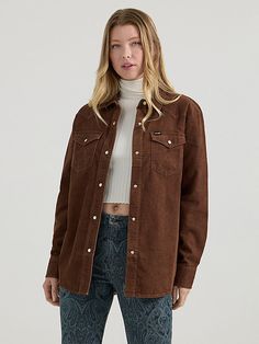 When cooler weather’s here to stay, you’ll want to wear our Women’s Corduroy Boyfriend Shirt every day. Offering a feminine take on the classic but looser look, this long-sleeve collared shirt is perfect for fall layering. It’s crafted for comfort from a soft corduroy fabric and finished with all the iconic Wrangler® details: Western-inspired yokes from front to back, chest pockets with flaps and the signature “W” embroidery, as well as a full pearl snap closure. Winter Corduroy Tops, Corduroy Jacket Outfit, Wrangler Women, Fall Layering, Corduroy Fabric, Boyfriend Shirt, Cooler Weather, Corduroy Jacket, Collared Shirt