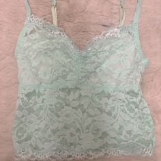 Victorias Secret Top, Has Moda International Tag, But Bought From Victorias Secret Years Back When They Sold Clothes, Never Worn Victoria's Secret Lace Tops For Summer, Green Lace Camisole Top, Green Lace Cami Top, Victoria's Secret Spring Camisole With Built-in Bra, Victoria's Secret Spring Party Camisole, Victoria's Secret Lace Camisole Top, Spring Party Camisole By Victoria's Secret, Victoria's Secret Lace Tops For Spring, Victoria's Secret Camisole Tops For Spring