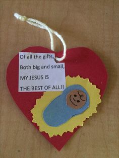 a heart shaped ornament with a message on it