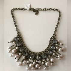 Beautiful Ann Taylor Loft Faux Pearl Beaded And Rhinestone Statement / Bib Necklace With An Antiqued Gold Tone Finish. Approx 18.5”-21.5” Long. Nwt Such A Fun Piece To Add To Your Collection! Glamorous Metal Beaded Necklaces, Glamorous Beaded Metal Necklaces, Embellished Metal Jewelry For Formal Occasions, Formal Embellished Metal Jewelry, Elegant Adjustable Embellished Necklaces, Adjustable Beaded Metal Rhinestone Necklace, Pearl Necklace With Rhinestones, Costume Jewelry Style, Pearl Necklace With Rhinestones In Costume Jewelry Style, Costume Jewelry Pearl Necklace With Rhinestones