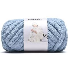 a blue ball of yarn with the label for stacner in white on it