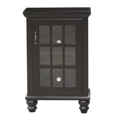 a small black cabinet with glass doors