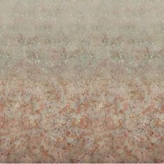 an orange and beige background with small speckles in the center, as well as other colors