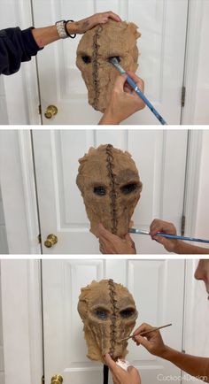 someone is doing something that looks like a human head and has been cut out with scissors