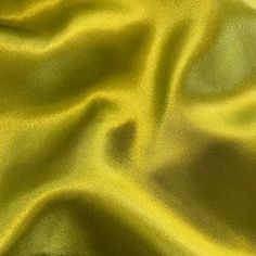 a close up view of a yellow fabric