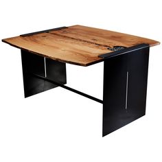 a wooden table with black metal legs and a wood slab on the top that has been cut into pieces