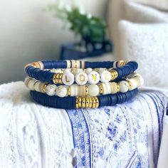 Beaded Stack of Boho Bracelets you can personalize, handcrafted with delicate blue, white, and gold beads that will add a touch of elegance to any outfit. This fashion accessory exudes an aura of understated glamour. The combination of the blue, white, and gold beads make this set a versatile accessory that can easily elevate any outfit. It's perfect for dressing up for parties or events, or for adding a pop of color and personality to your everyday look. Very simple, versatile, goes with any ou Boho Bangles, Boho Bangle, Stack Bracelet, Bracelets Beaded, Blue Party, Summer Bracelets, Jewelry Blue, Birthday Gifts For Sister, Bracelets For Women