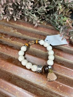 Stone smooth round beads, wooden beads and a faceted crystal bead with and one stone dangle charm. Silver accents. Stretch bracelet. Large Bead Bracelet, Bracelet With Stone, Bracelet Ideas, Dangle Charms, Faceted Crystal, Silver Accents, Stretch Bracelet, Wooden Beads, Stretch Bracelets