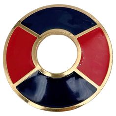 This is a gold tone round pin brooch designed by YSL in 1990’s. The piece is gold plated. It is adorned with red and blue enamel. Signed: "YSL. Made in France” (shown in photos). Diameter: 4.7cm ——— If you have any questions, please feel free to ask. We describe our items accurately. Please note that in reality they can look much better because photo can’t capture that magical sparkle. We have many years of experience in this business. And we have a very carefully curated selection of pieces. You can buy with confidence. Thank you for your consideration. ——— "Laura Antiques Fine Jewellery” is a successful family-owned business since 2009. Our enthusiasm for finding fine jewellery around the world and establishing a long-lasting relationship with our clients led us to turn a hobby into our Ysl Gold, Vintage Yves Saint Laurent, David Webb, Diamond Brooch, Christian Lacroix, Antique Jewellery, Rose Cut Diamond, Pin Brooch, Victorian Fashion