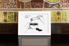 a drawing of a hand holding a coffee cup