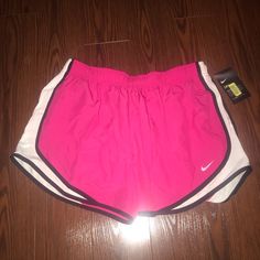 New With Tags Lined Inside Pink Fitted Athletic Shorts For Summer, Fitted Pink Athletic Shorts For Summer, Pink Stretch Athletic Shorts For Spring, Pink Nike Fitted Shorts, Nike Fitted Pink Shorts, Nike Pink Fitted Shorts, Fitted Pink Nike Shorts, Pink Athletic Shorts For Spring Workout, Fitted Pink Athletic Shorts For Spring