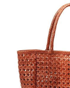 Maison N.H Paris Annette Petit Cuir Bag in Picante - Bliss Luxury Rectangular Bags For Market, Luxury Rectangular Bucket Bag With Braided Handles, Leather Bucket Bag With Natural Color, Natural Leather Bucket Bag With Handles, Cognac Woven Leather Shopping Bags, Luxury Natural Leather Bucket Bag, Woven Leather Bucket Bag Tote, Rectangular Woven Leather Bucket Bag For On-the-go, Everyday Cognac Woven Leather Bag