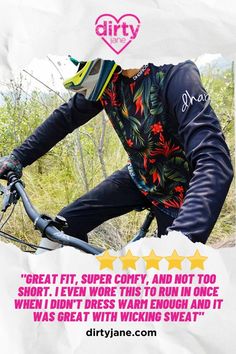 a man riding a bike on top of a lush green field next to a quote that reads, great fit, super comfy, and not too short i even wore