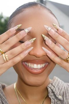 Nail ideas nail inspo long nails almond nails Gel X Nails Long Almond, 21st Birthday Almond Nails, Long Almond Acrylic Nails Gold, Chrome Nails Designs With Charms, Red And Gold French Tip Nails Almond, Rihanna Almond Nails, Gold White French Nails, Glam Nail Art Design, Nail Inspo Sharp Almond