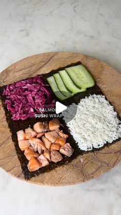 a wooden platter filled with different types of food on top of a white counter