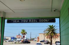 there is a sign that says sea you reel soon