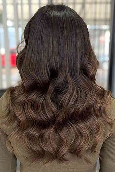 Long Wavy Chocolate Brown Hair Balayage with Lighter Ends