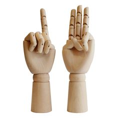 two wooden hand puppets with fingers raised up