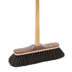 a broom with a wooden handle on a white background