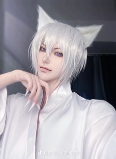 an anime character with white hair and cat ears