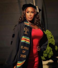 a woman wearing a graduation cap and gown