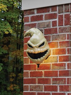 a brick wall with a face on it