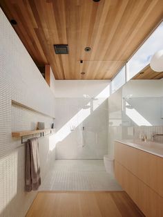 an instagram photo of a bathroom with wood ceiling and tile flooring, along with the caption that reads instagram