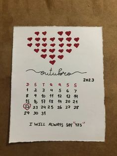 a calendar with hearts drawn on it and the date is written in cursive writing