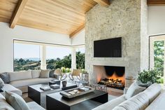 a living room with couches and a fireplace