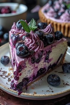 a slice of blueberry cheesecake on a plate