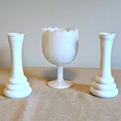 2 x 6 inch tall White Milk Glass bud vase by Randall. Three tiered beehive style. Mid century modern. 1 White Milk Glass Goblet Vase Planter with Stars and Scalloped Edge 6-3/8" Tall No chips, no staining. Mint condition. Free shipping to the US when you spend $35+ Returns accepted within 30 days if the product is not as pictured/described.  Happy to send as a gift and gift wrapping is free.  I can ship directly to the recipient for you. Just let me know it's a gift. I'm a small shop and offer personalized service, so reach out to me anytime! Thank you for checking out my shop, Rotated Retro. White Milk Glass, Bud Vase, Scalloped Edge, 1960s Vintage, Bee Hive, Glass Set, Bud Vases, Small Shop, Milk Glass