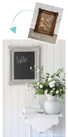 a white table topped with flowers next to a chalkboard and vase filled with flowers